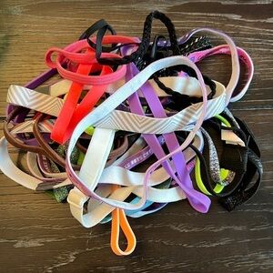 16 activewear headbands, thin. Multiple colors and brands.